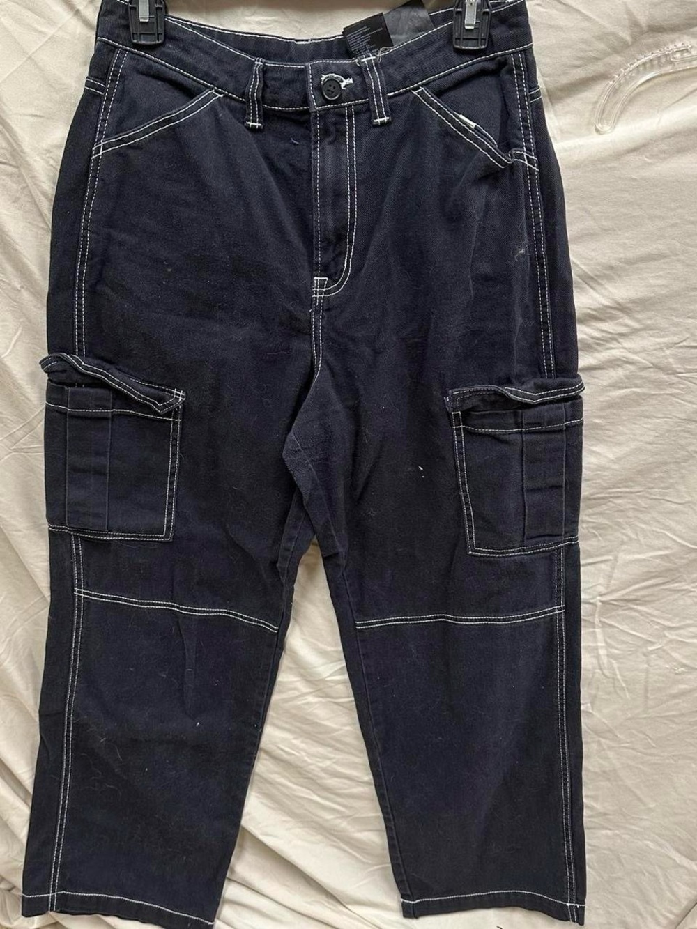 Black & white cargo jean pants.